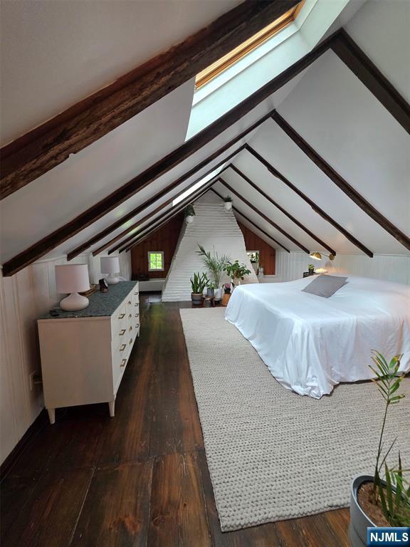 bedroom featuring dark wood-style flooring