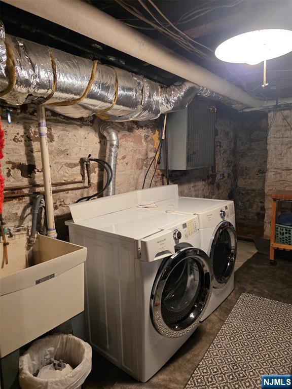washroom featuring separate washer and dryer
