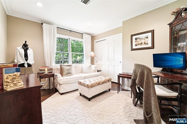office space with wood finished floors, crown molding, and recessed lighting