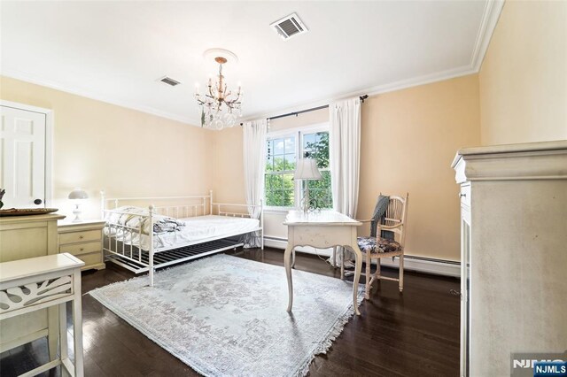 bedroom with dark wood-style floors, ornamental molding, and a chandelier