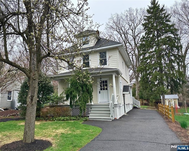 14 Harvard Ave, Wyckoff, NJ 07481 - american foursquare style home with a front yard and covered porch