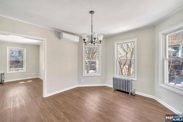 14 Harvard Ave, Wyckoff, NJ 07481 - unfurnished dining area featuring radiator, a wall unit AC, a chandelier, dark wood-style floors, and crown molding