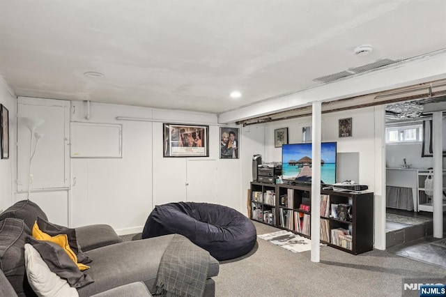 living area with carpet