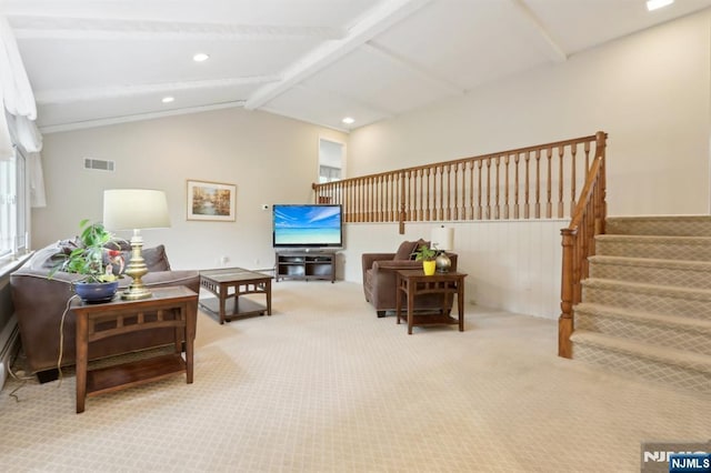 living area with carpet floors, recessed lighting, and stairway