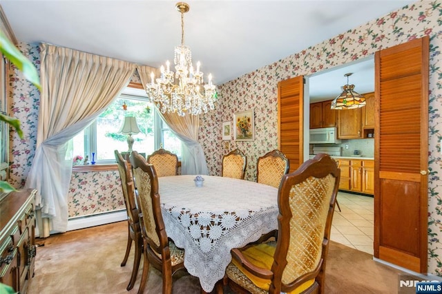 dining area with wallpapered walls, a chandelier, a baseboard heating unit, light colored carpet, and light tile patterned flooring
