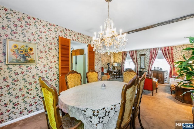 dining area featuring wallpapered walls, carpet flooring, a chandelier, and baseboards
