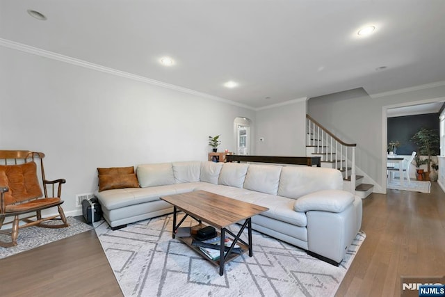 205 Elizabeth, Oradell, NJ 07649 - living room with wood finished floors, stairway, arched walkways, crown molding, and recessed lighting