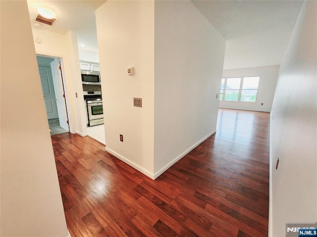 326 The Promenade Unit 326, Edgewater, NJ 07020 - corridor featuring wood finished floors and baseboards