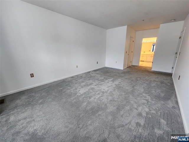 326 The Promenade Unit 326, Edgewater, NJ 07020 - unfurnished room featuring carpet and baseboards