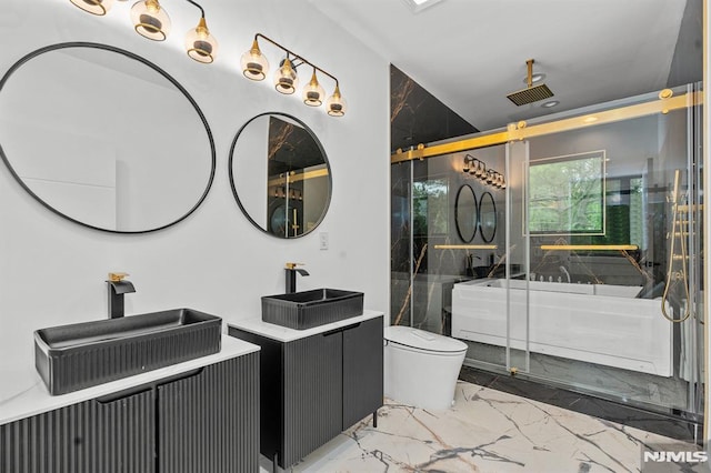 bathroom featuring marble tiled flooring, a stall shower, two vanities, and toilet