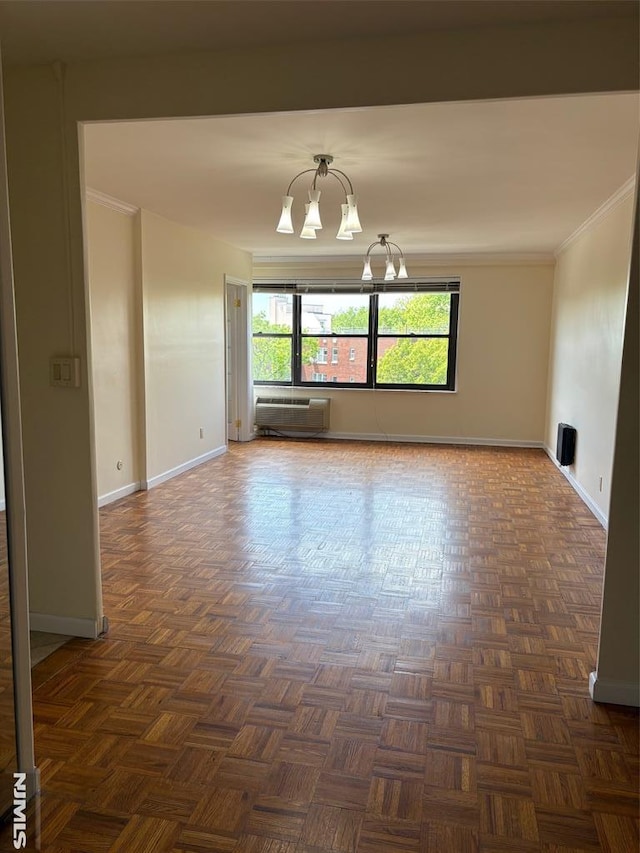 2352 Linwood Ave Unit 7A, Fort Lee, NJ 07024 - unfurnished room with a chandelier, a wall unit AC, baseboards, and crown molding