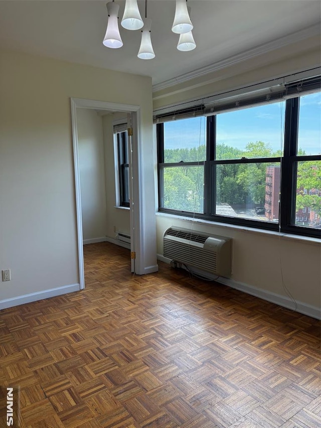 2352 Linwood Ave Unit 7A, Fort Lee, NJ 07024 - unfurnished room featuring a wall unit AC, healthy amount of natural light, a baseboard heating unit, and baseboards
