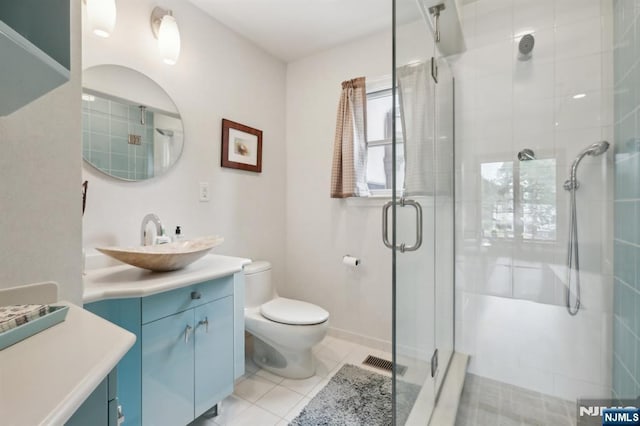 435 Cypress Ct, New Milford, NJ 07646 - bathroom featuring vanity, a shower stall, toilet, and tile patterned floors