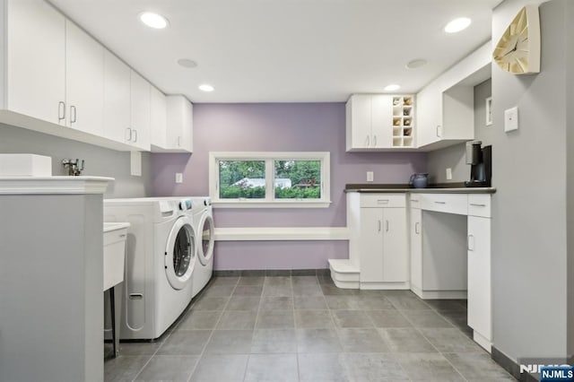 435 Cypress Ct, New Milford, NJ 07646 - laundry room with washing machine and clothes dryer, cabinet space, recessed lighting, light tile patterned flooring, and baseboards