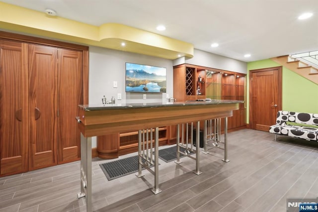 435 Cypress Ct, New Milford, NJ 07646 - indoor wet bar featuring stairway, light wood-style flooring, and recessed lighting