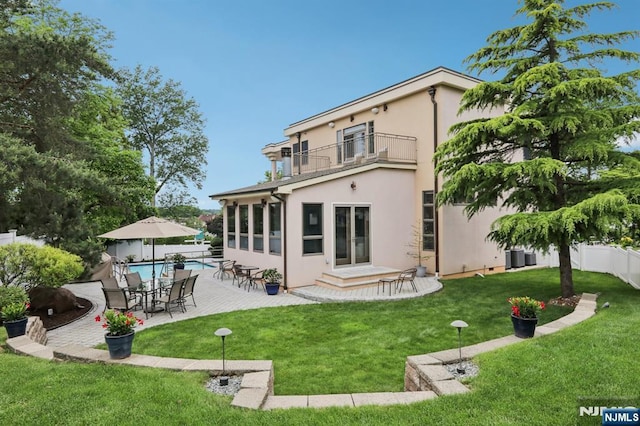 435 Cypress Ct, New Milford, NJ 07646 - rear view of property with a balcony, stucco siding, a patio, and central AC