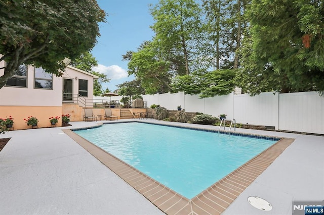435 Cypress Ct, New Milford, NJ 07646 - view of swimming pool featuring a fenced backyard and a patio