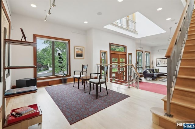 435 Cypress Ct, New Milford, NJ 07646 - living area with wood finished floors, stairway, and recessed lighting
