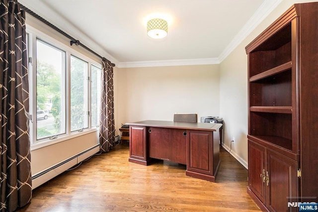 office area with a baseboard heating unit, ornamental molding, light wood finished floors, and baseboards