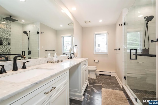 bathroom with marble finish flooring, toilet, a shower stall, a baseboard radiator, and double vanity