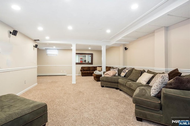 living room featuring a baseboard radiator, recessed lighting, carpet flooring, and baseboards
