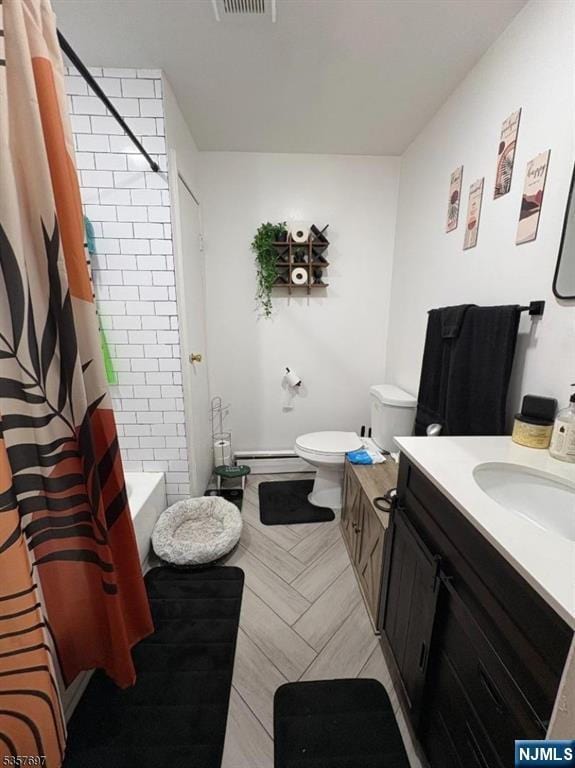 full bath with toilet, vanity, shower / bath combination with curtain, baseboards, and baseboard heating
