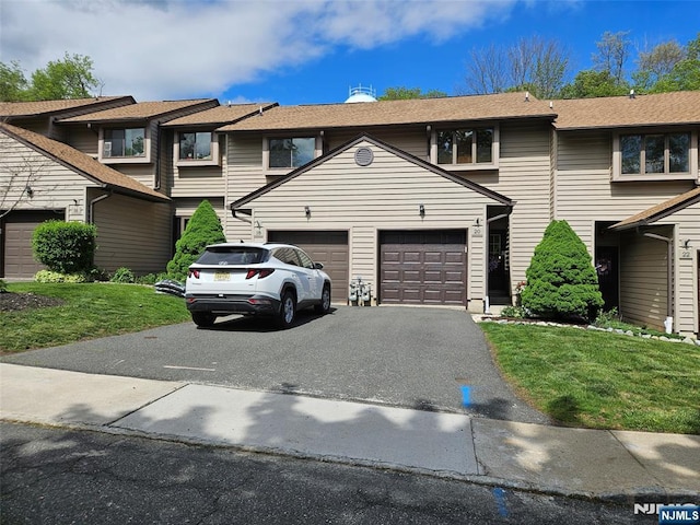 20 Eagle Dr, Hampton, NJ 07860 - townhome / multi-family property with an attached garage, asphalt driveway, and a front lawn