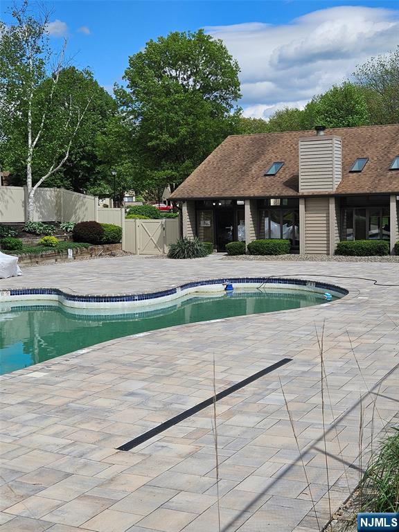 20 Eagle Dr, Hampton, NJ 07860 - view of pool with a patio area, a gate, and fence