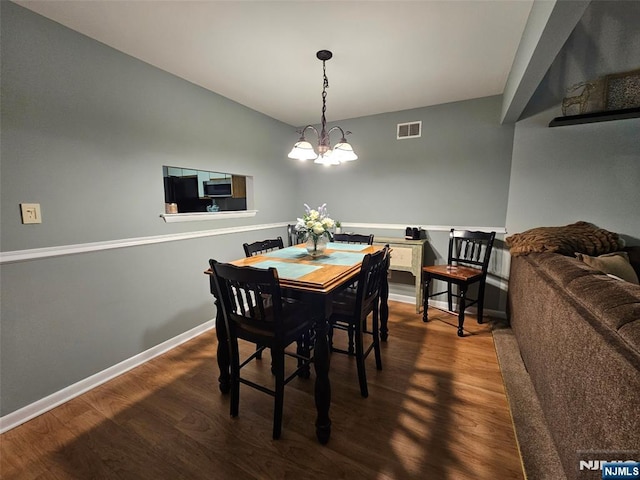 20 Eagle Dr, Hampton, NJ 07860 - dining area with wood finished floors, baseboards, and a chandelier