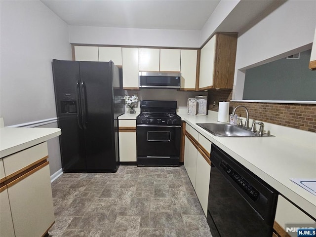 20 Eagle Dr, Hampton, NJ 07860 - kitchen with black appliances, a sink, light countertops, and white cabinetry