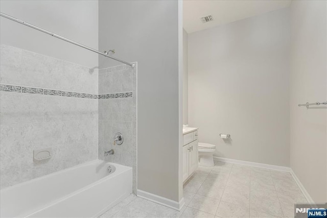 full bathroom featuring baseboards, vanity, tile patterned flooring, tub / shower combination, and toilet