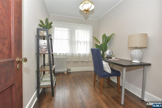 228 Ridgefield Ave, Bogota, NJ 07603 - home office with radiator, dark wood-type flooring, baseboards, and crown molding