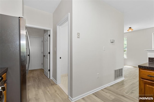 52 Straton Ct Unit 1006, Sayreville, NJ 08859 - hallway featuring light wood-style flooring and baseboards