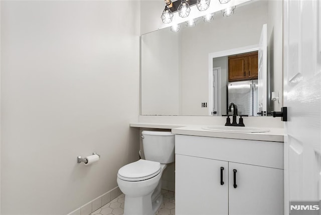 52 Straton Ct Unit 1006, Sayreville, NJ 08859 - half bathroom featuring toilet, vanity, and tile patterned floors