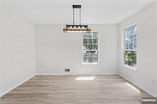 52 Straton Ct Unit 1006, Sayreville, NJ 08859 - unfurnished dining area with light wood-type flooring and baseboards