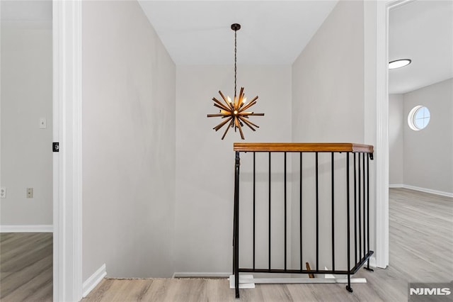 52 Straton Ct Unit 1006, Sayreville, NJ 08859 - detailed view of a chandelier, wood finished floors, and baseboards
