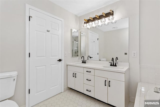52 Straton Ct Unit 1006, Sayreville, NJ 08859 - full bath with toilet, double vanity, tile patterned flooring, and baseboards