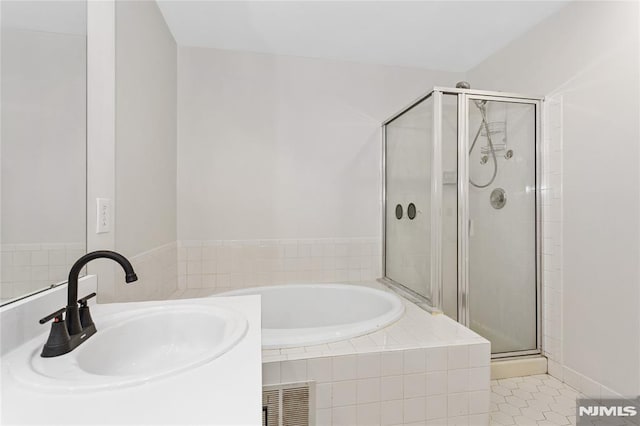52 Straton Ct Unit 1006, Sayreville, NJ 08859 - bathroom with a sink, a shower stall, a garden tub, and tile patterned floors