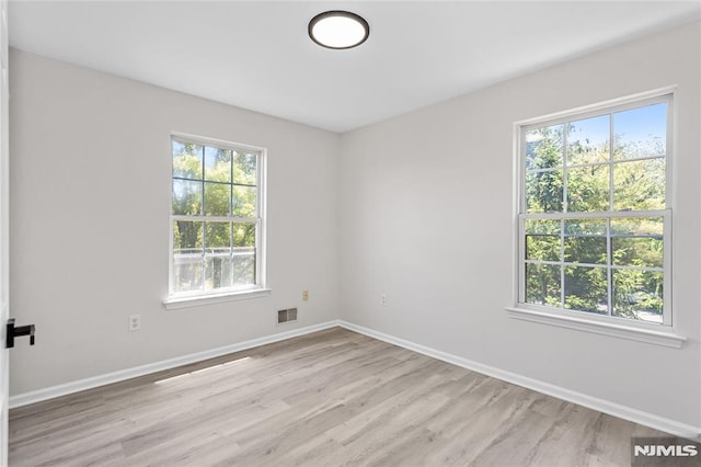 52 Straton Ct Unit 1006, Sayreville, NJ 08859 - unfurnished room with light wood finished floors and baseboards