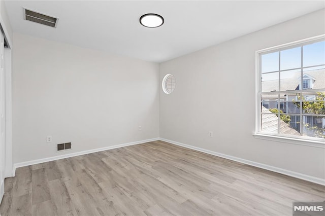 52 Straton Ct Unit 1006, Sayreville, NJ 08859 - spare room featuring light wood-style floors and baseboards