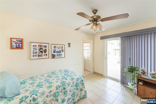 bedroom featuring access to outside, light tile patterned flooring, and ceiling fan