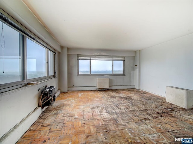 377 S Harrison St Unit 18Aa, East Orange, NJ 07018 - unfurnished room featuring a baseboard radiator