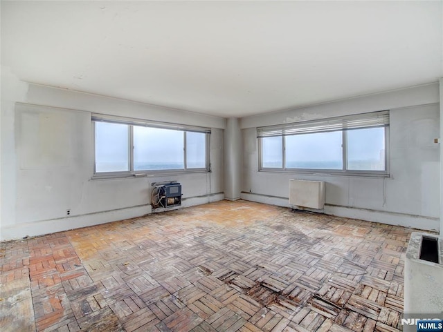 377 S Harrison St Unit 18Aa, East Orange, NJ 07018 - spare room featuring heating unit