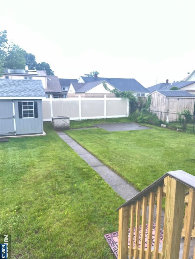 60 Palisades, Bergenfield, NJ 07621 - view of yard with a storage shed and an outdoor structure