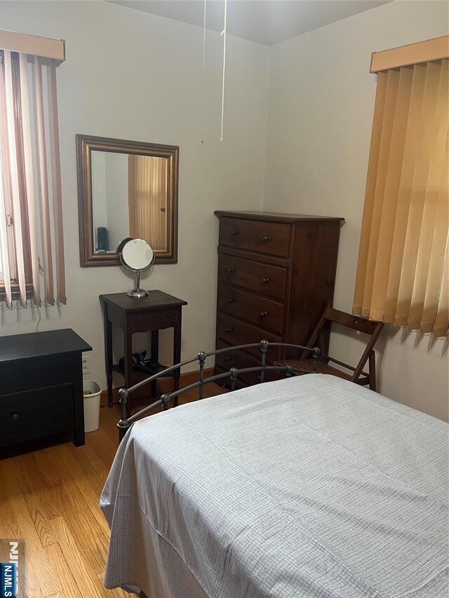 60 Palisades, Bergenfield, NJ 07621 - bedroom with light wood-style flooring