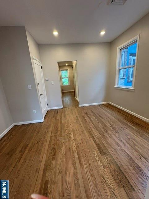 150 W 29th, Bayonne, NJ 07002 - empty room with baseboards, wood finished floors, and recessed lighting