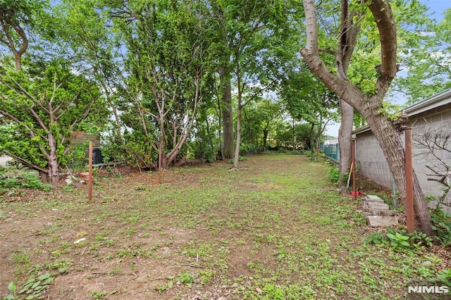 view of yard with fence