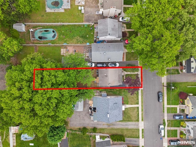 aerial overview of property's location featuring property boundaries highlighted