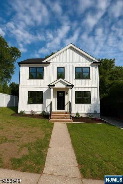 modern farmhouse featuring board and batten siding