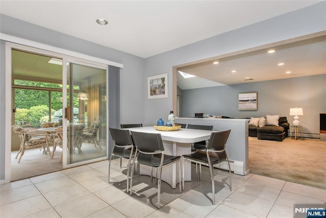 dining space with light colored carpet, light tile patterned floors, recessed lighting, and baseboard heating